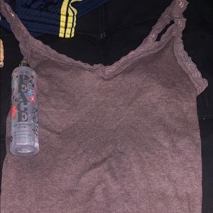lightly used perfume, and tank top. no holes or stains